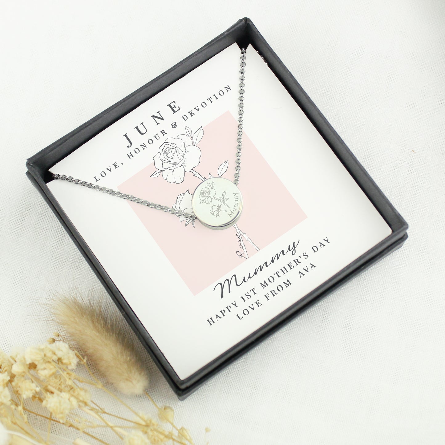 Necklace in a gift box with a personalised message on a white background