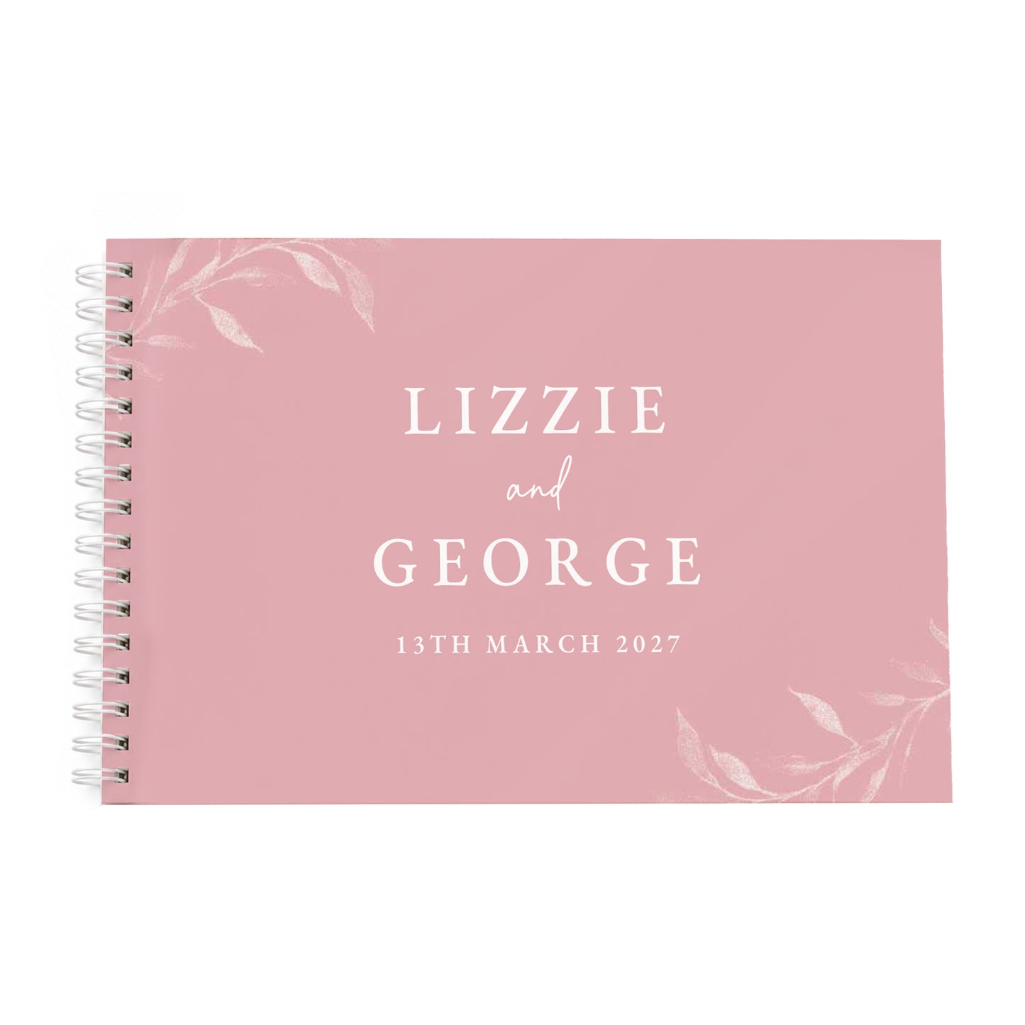 A pink spiral-bound guest book with white text reading 'LIZZIE and GEORGE 13TH MARCH 2027' and delicate white floral illustrations in the corners, shown on a plain white background.