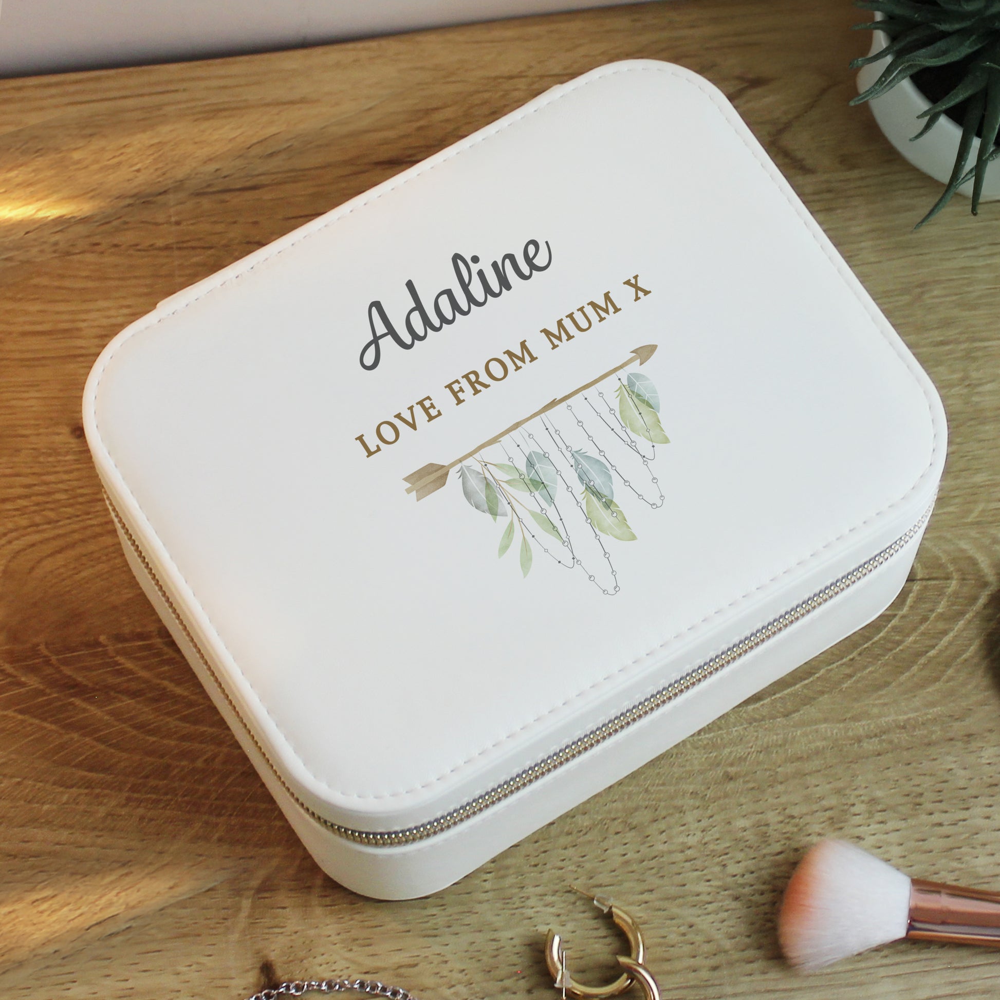 White jewelry box with 'Addaline Love from Mum X' text on a wooden surface