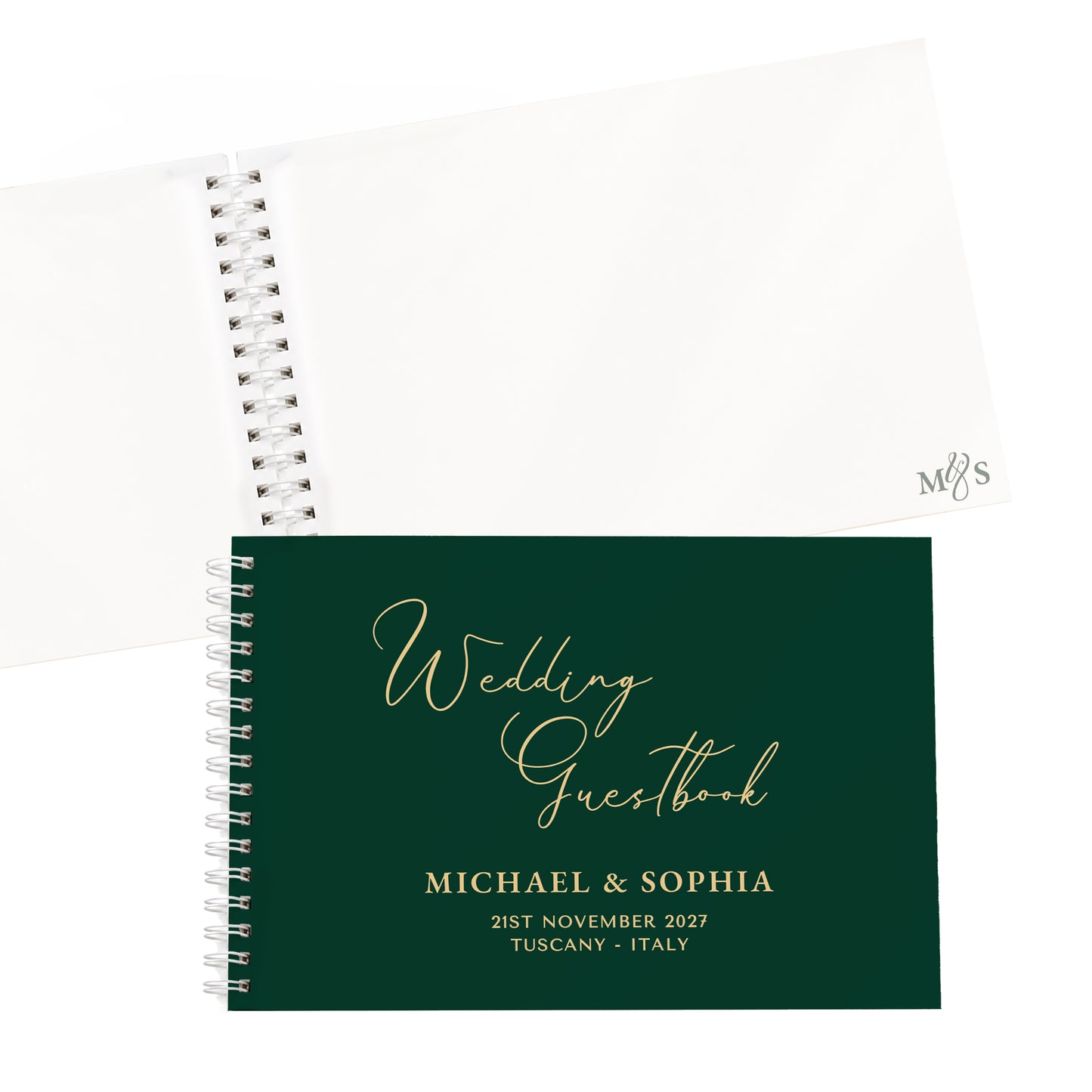 A personalised wedding guestbook with a dark green cover and gold foil lettering, shown in front of an open white page spread on a white background.