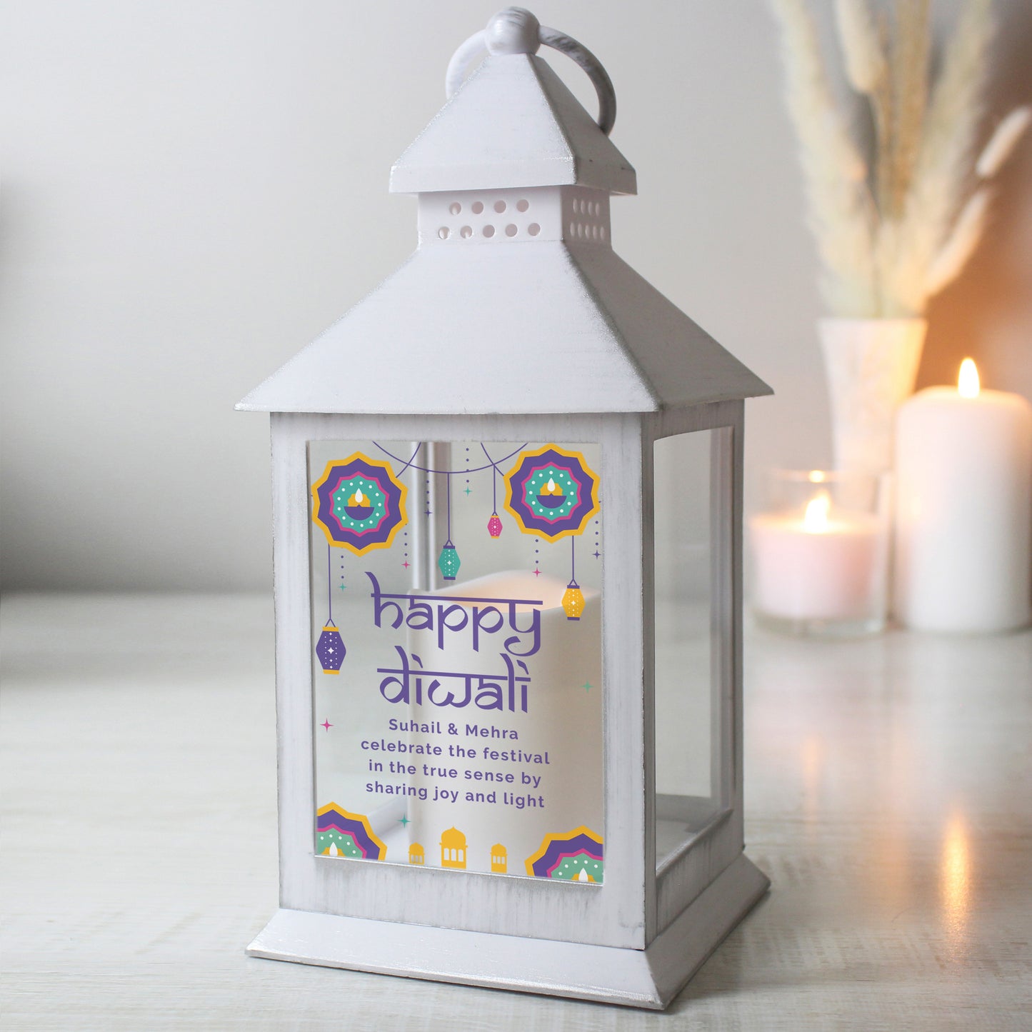 White lantern with a personalised Diwali message on a light background