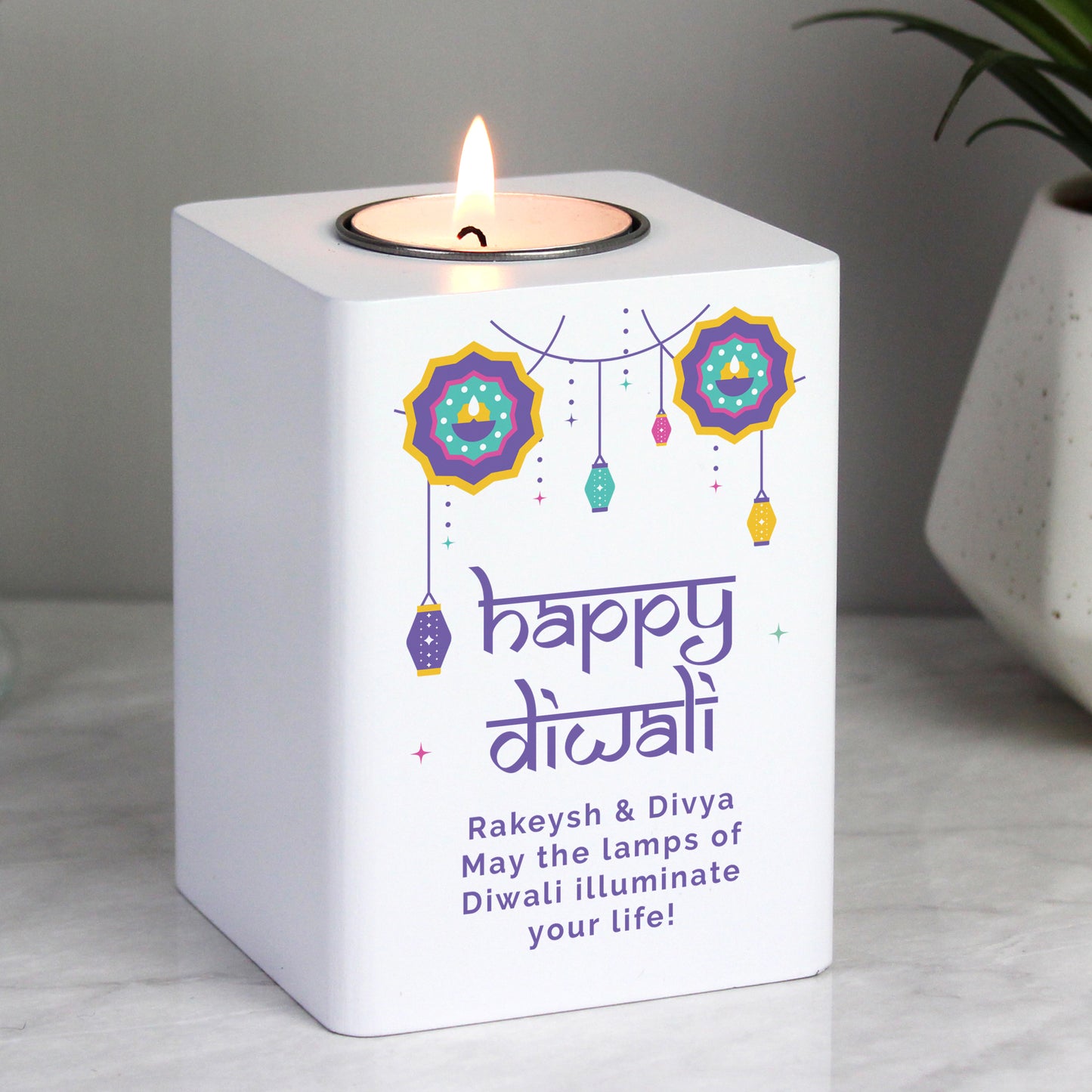 Personalised Diwali tealight holder. Text reads Happy Diwali. Rakeysh & Divya May the lamps of Diwali illuminate your life!