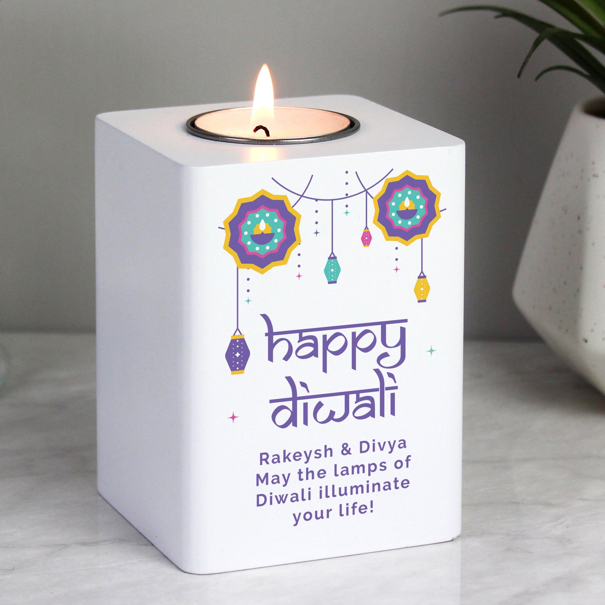 Personalised Diwali tealight holder. Text reads Happy Diwali. Rakeysh & Divya May the lamps of Diwali illuminate your life!