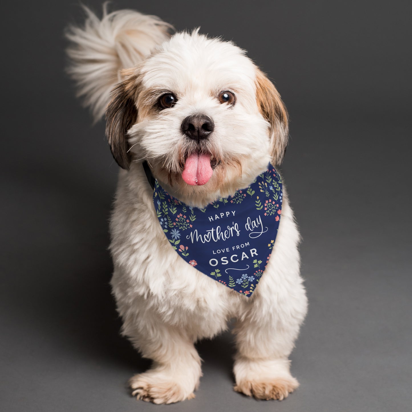 Personalised Mother's Day Dog Bandana in navy floral fabric modelled by a white Shih Tzu dog showing message in white text - Happy Mother's Day Love From Oscar