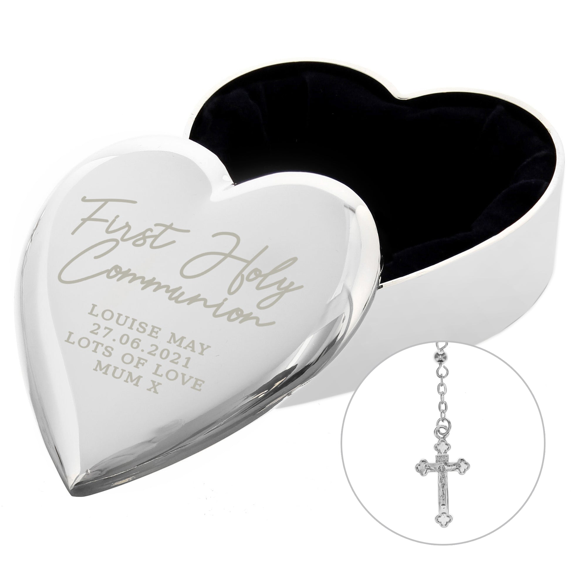 Heart-shaped silver box with engraved text and a small cross pendant on a white background