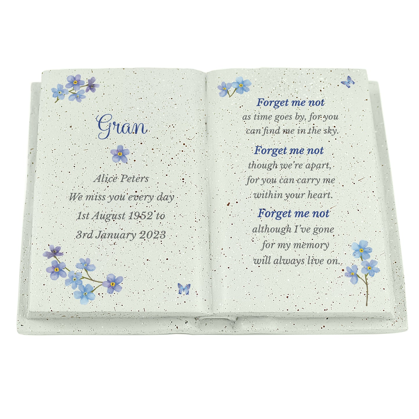 Memorial book with floral designs and text for a departed loved one on a white background