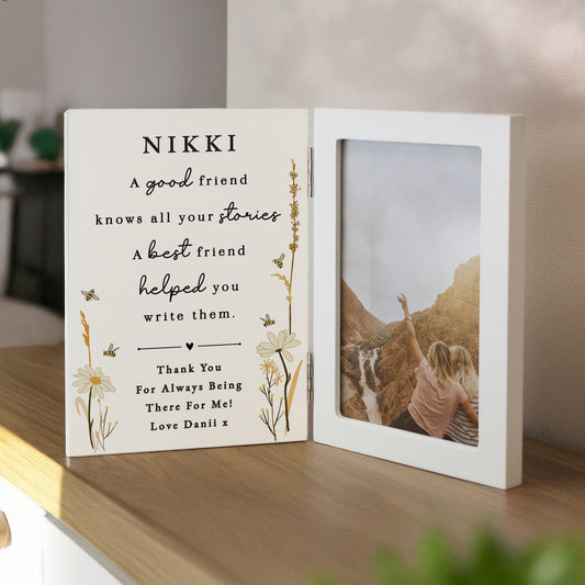 Personalised photo frame with a message and a photo of two people on a mountain.