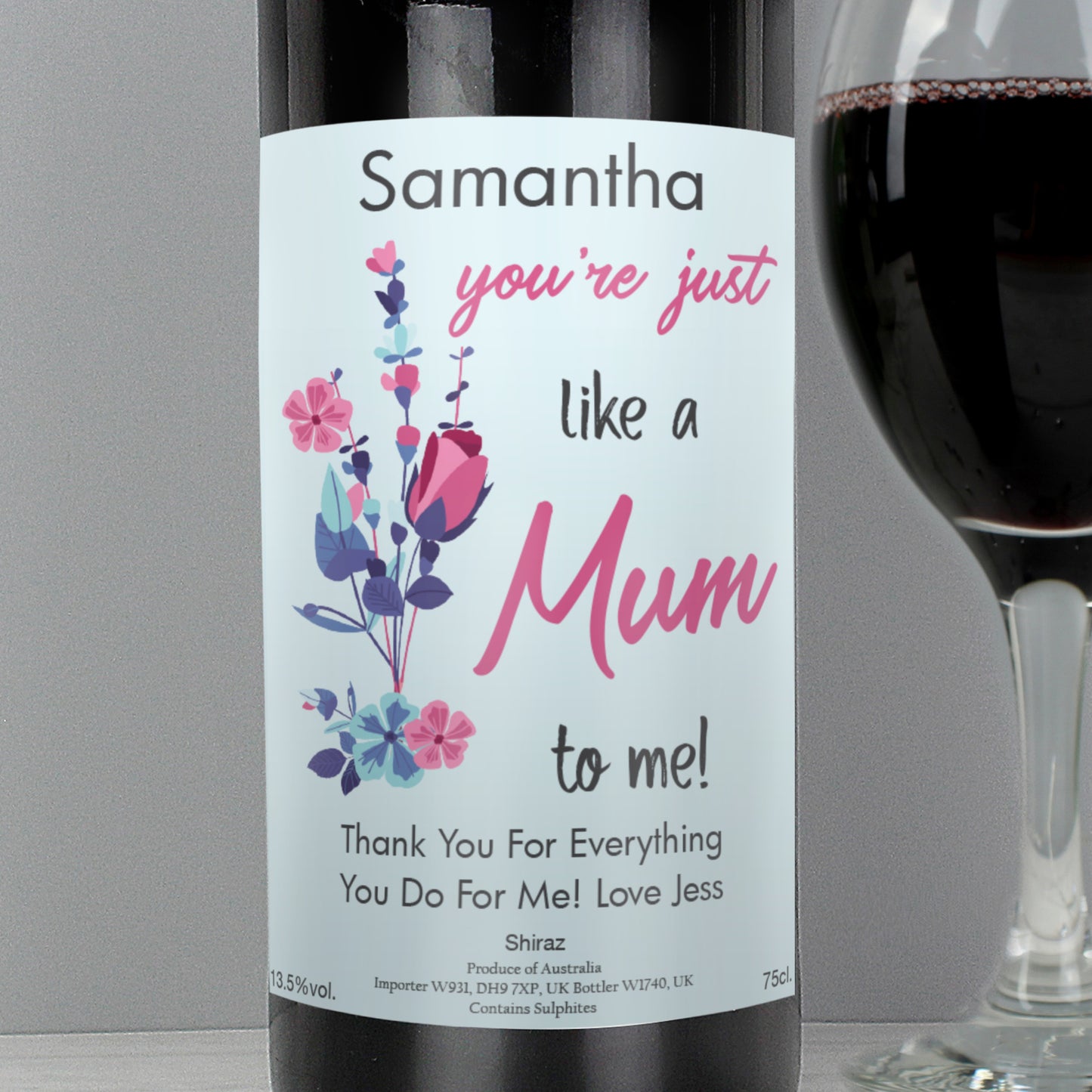 Wine bottle with a personalised label reading 'Samantha, you're just like a Mum to me! Thank you for everything you do for me. Love Jess'.