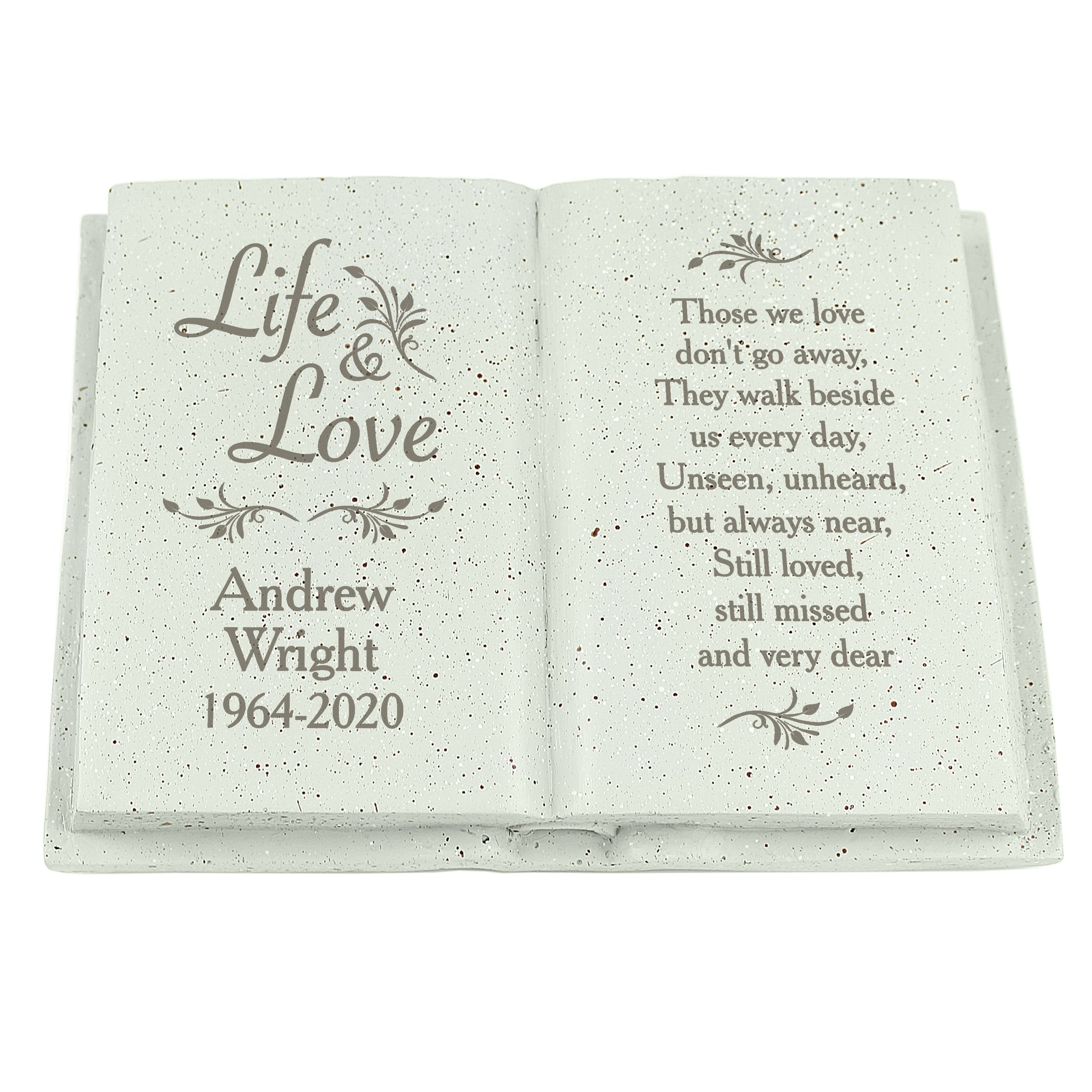 Memorial stone with engraved text 'Life & Love' and personalised name and year.