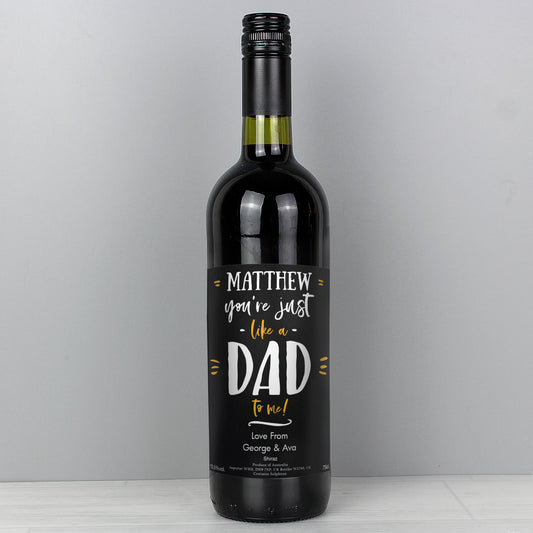 Wine bottle with a personalised label on a grey background
