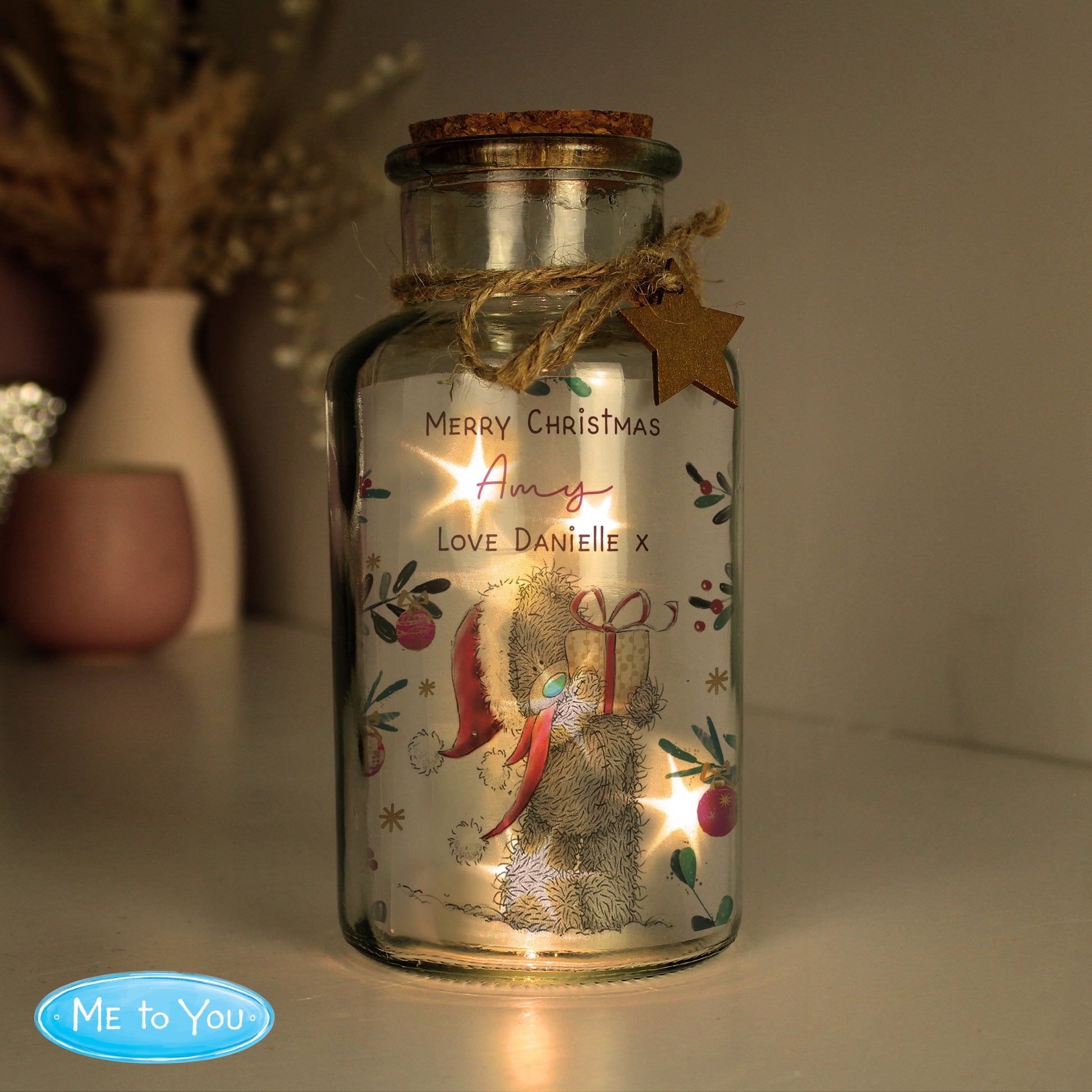 Decorative glass jar with a teddy bear design and 'Merry Christmas' message, featuring the Me to You brand.