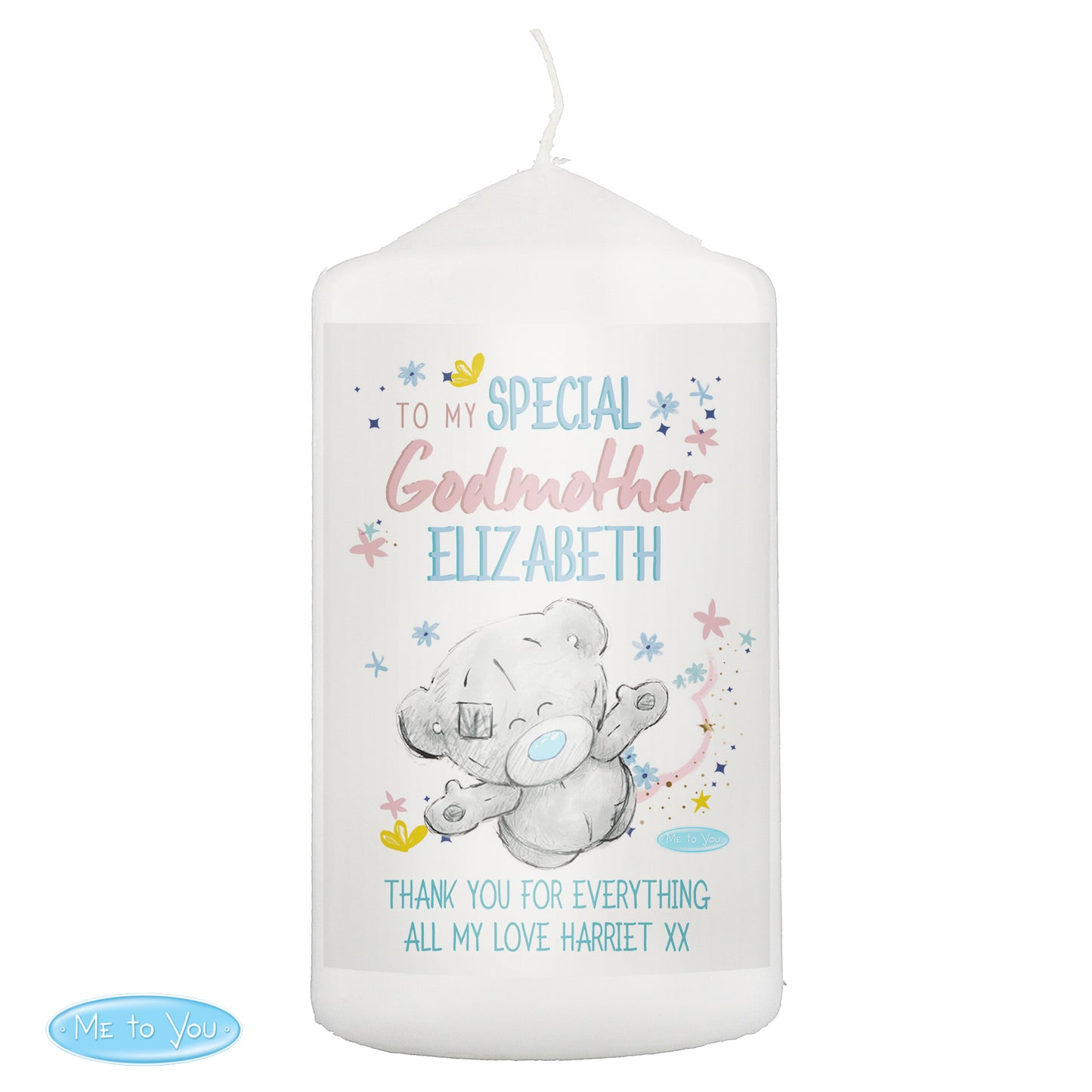 White candle with teddy bear design and personalised text on a white background
