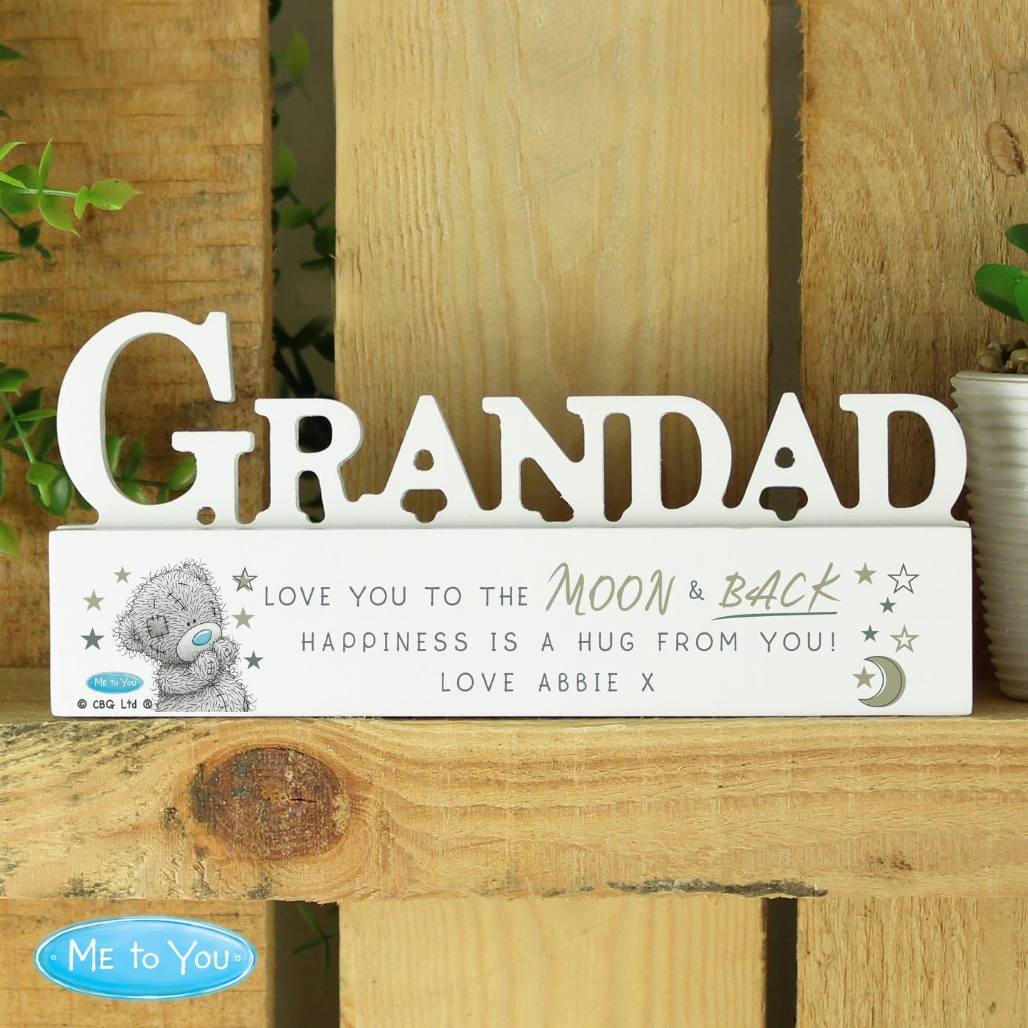 Decorative sign with 'GRANDAD' and a message, featuring a Me to You bear, on a wooden surface.