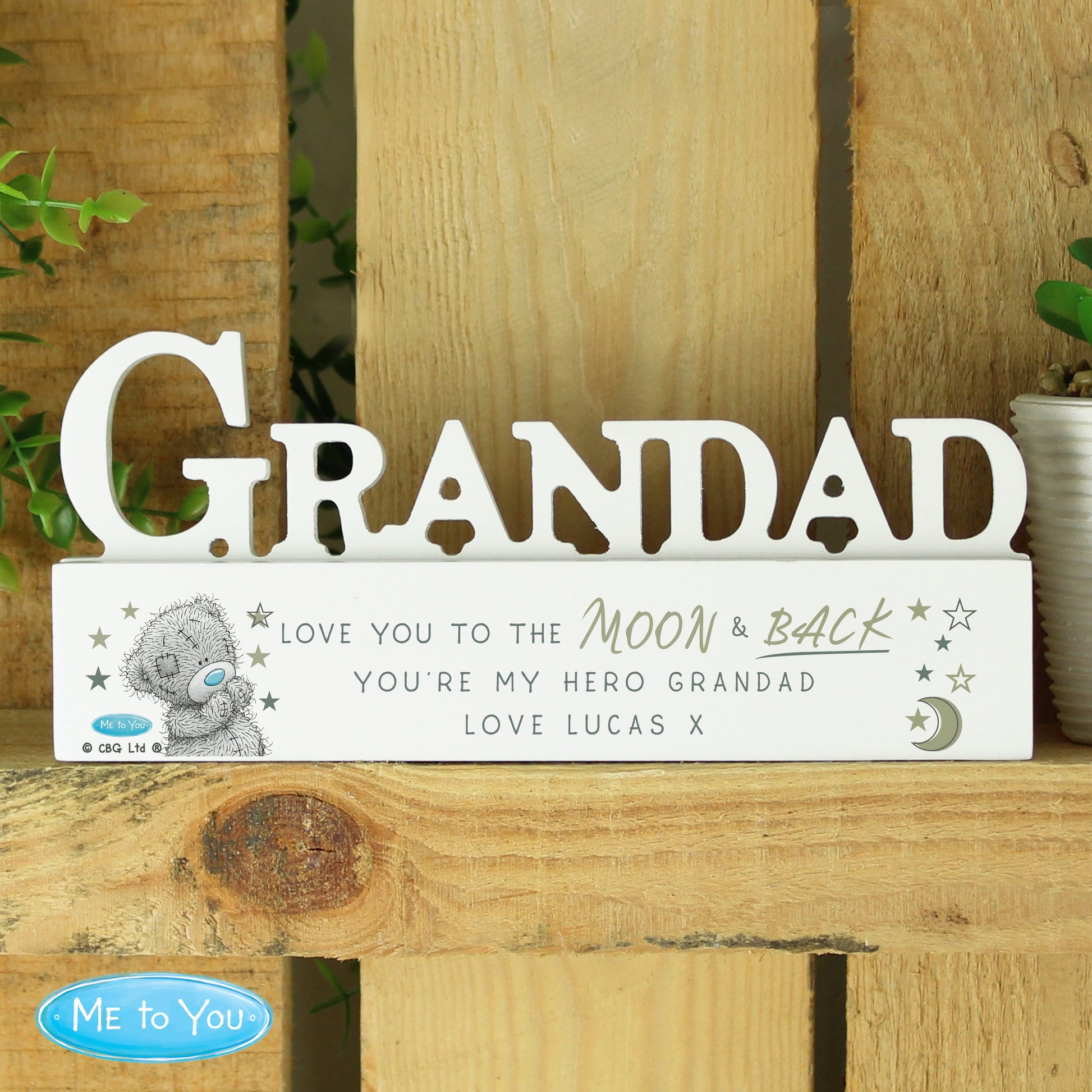 Decorative sign with 'GRANDAD' and a message for a grandad on a wooden surface.