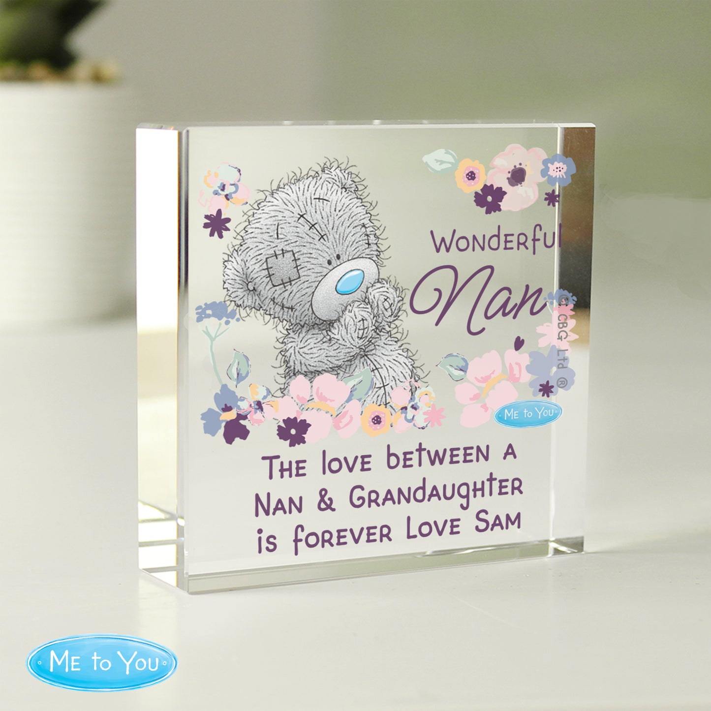 Glass plaque with teddy bear design and floral elements, featuring text 'Wonderful Nan' and 'Me to You' branding.
