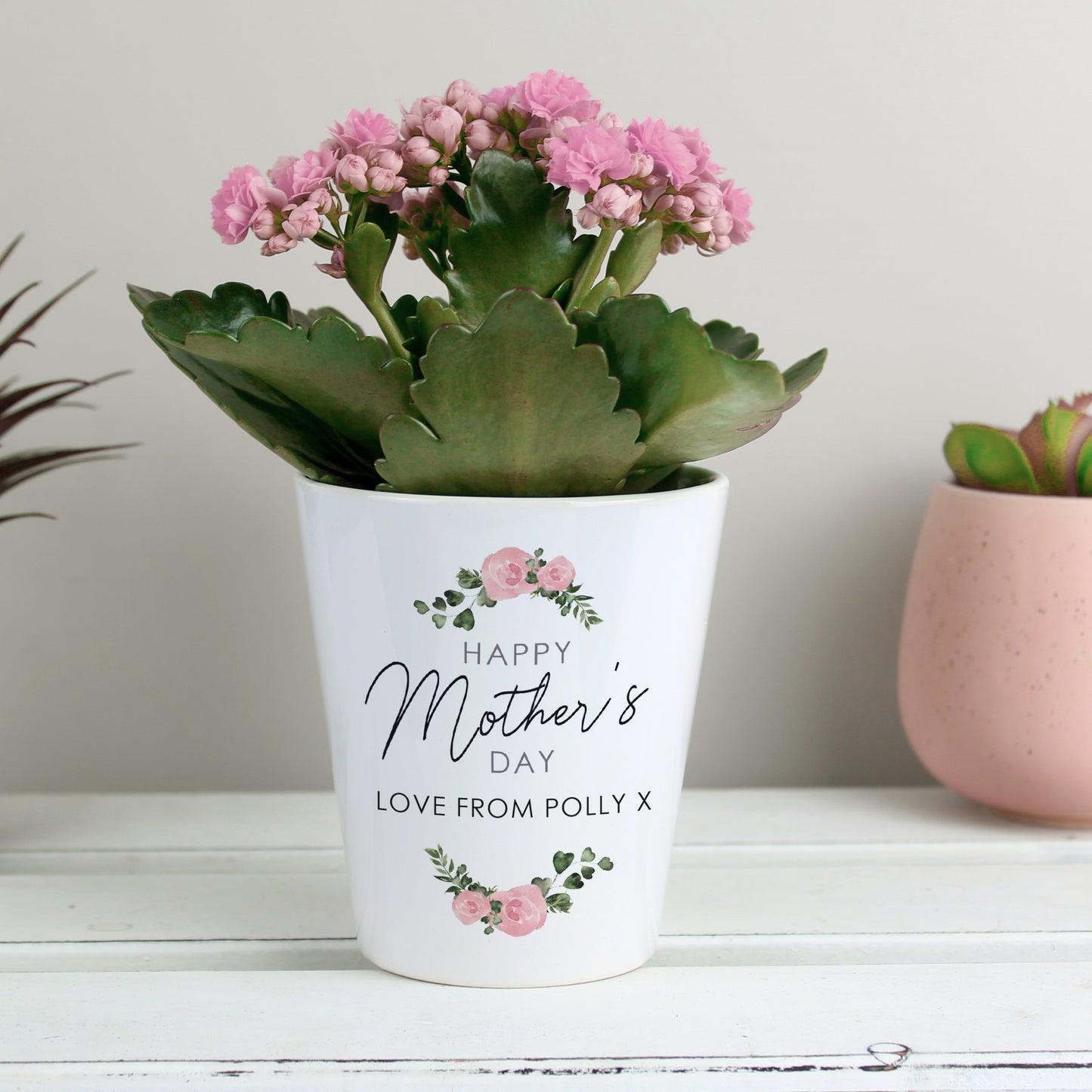 Personalised Mother's Day Abstract rose Design Plant Pot showing white pot with message and rose design. Message reads - Happy Mother's Day Love From Polly.