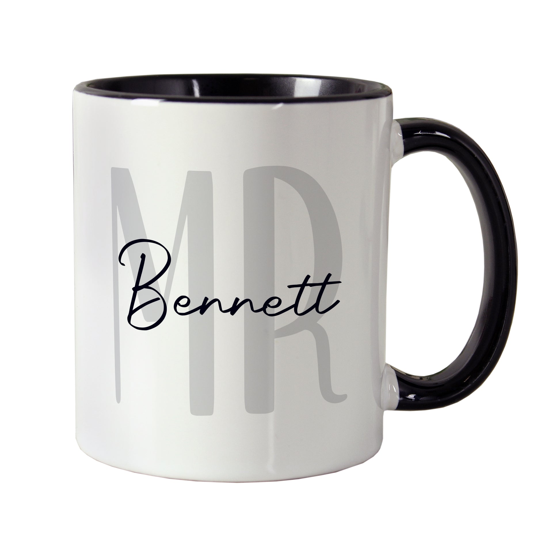 White mug with black handle featuring 'MR Bennett' text on a white background