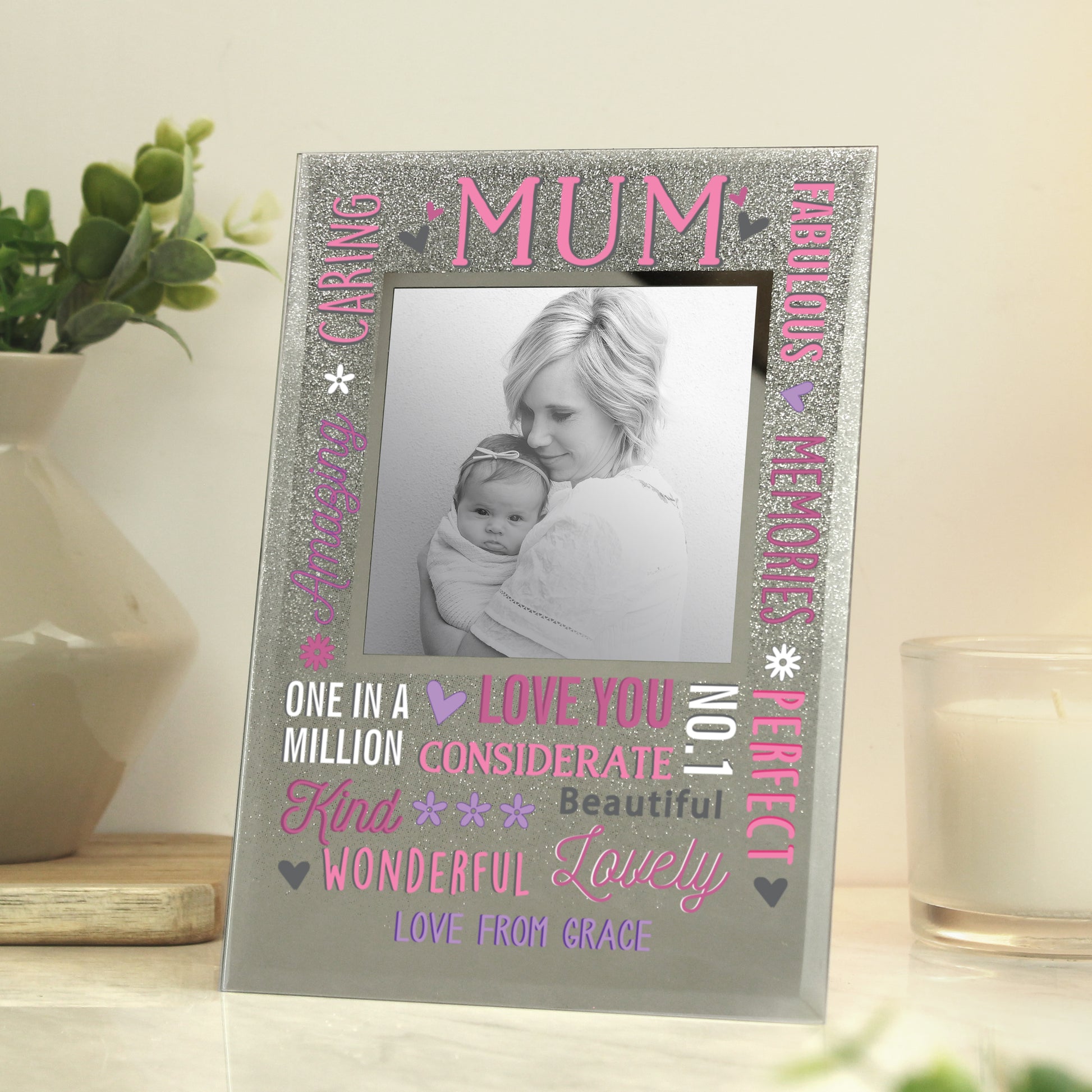 Personalised Mum Glitter Frame shown with black and white image of a Mum with baby.