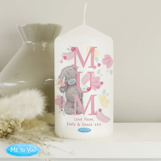 Candle with 'MUM' text and cartoon character, featuring 'Me to You' branding, on a neutral background.