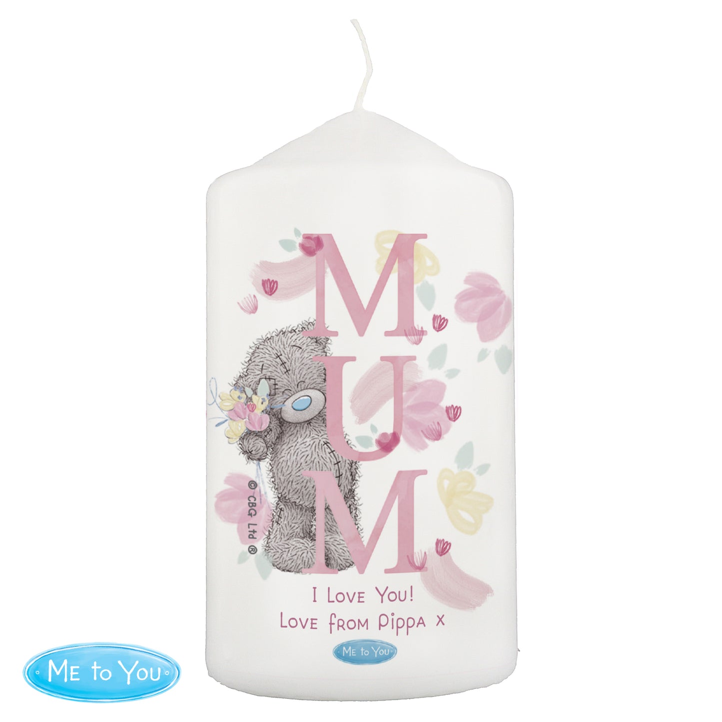 Candle with 'MUM' text and teddy bear design on a white background