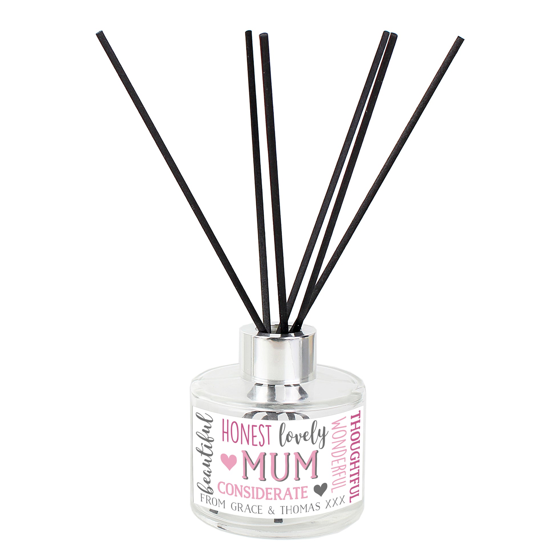 Diffuser with black sticks and a decorative label on a white background
