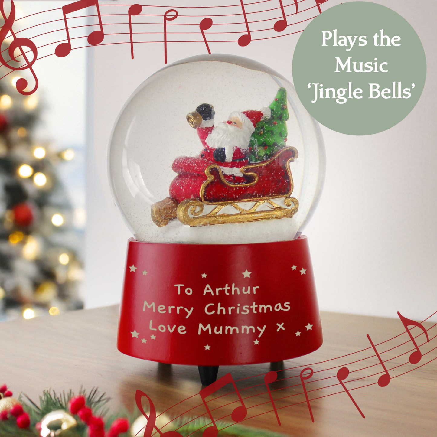 Red Snow Globe with sleigh inside. Musical notes and Christmas tree.
