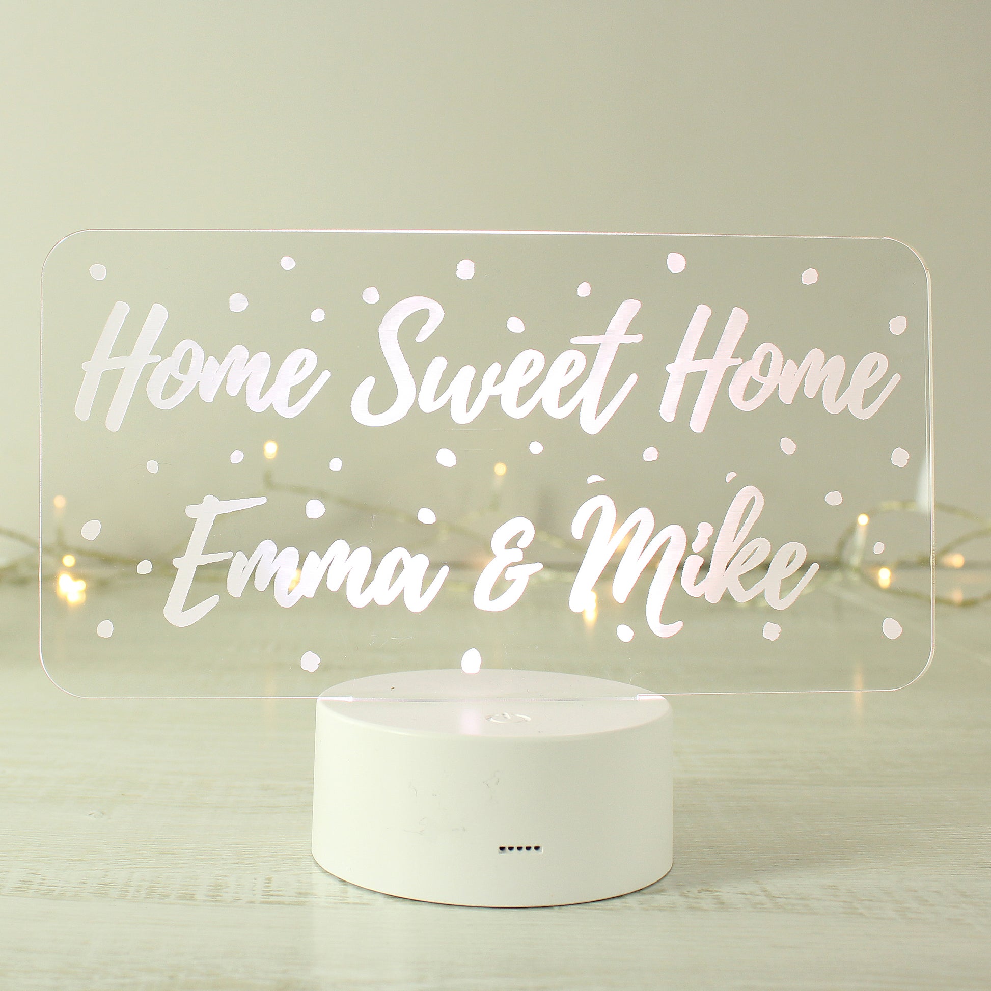Clear Home Sweet Home Emma & Mike sign on a white base.