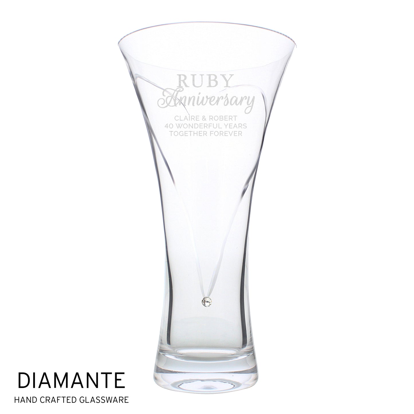 Clear glass vase with engraved text on a white background
