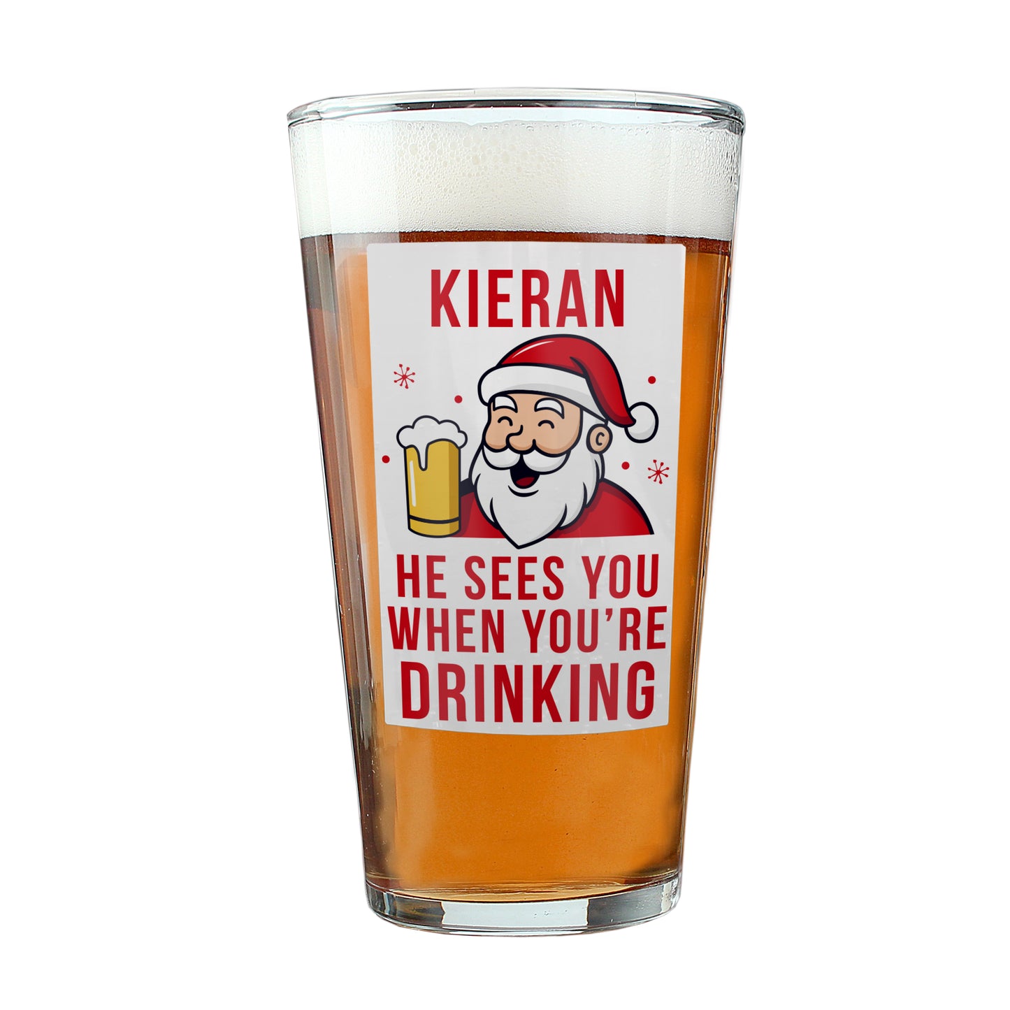 Pint glass with a printed design of a Santa Claus character and text, filled with beer.