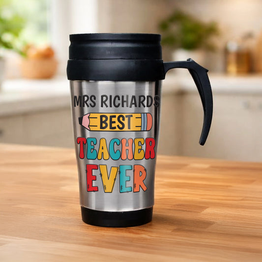 Travel mug with 'Mrs Richards Best Teacher Ever' text on a wooden surface