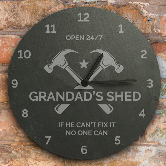 Wall clock with 'Grandad's Shed' text and tools design on a rustic background