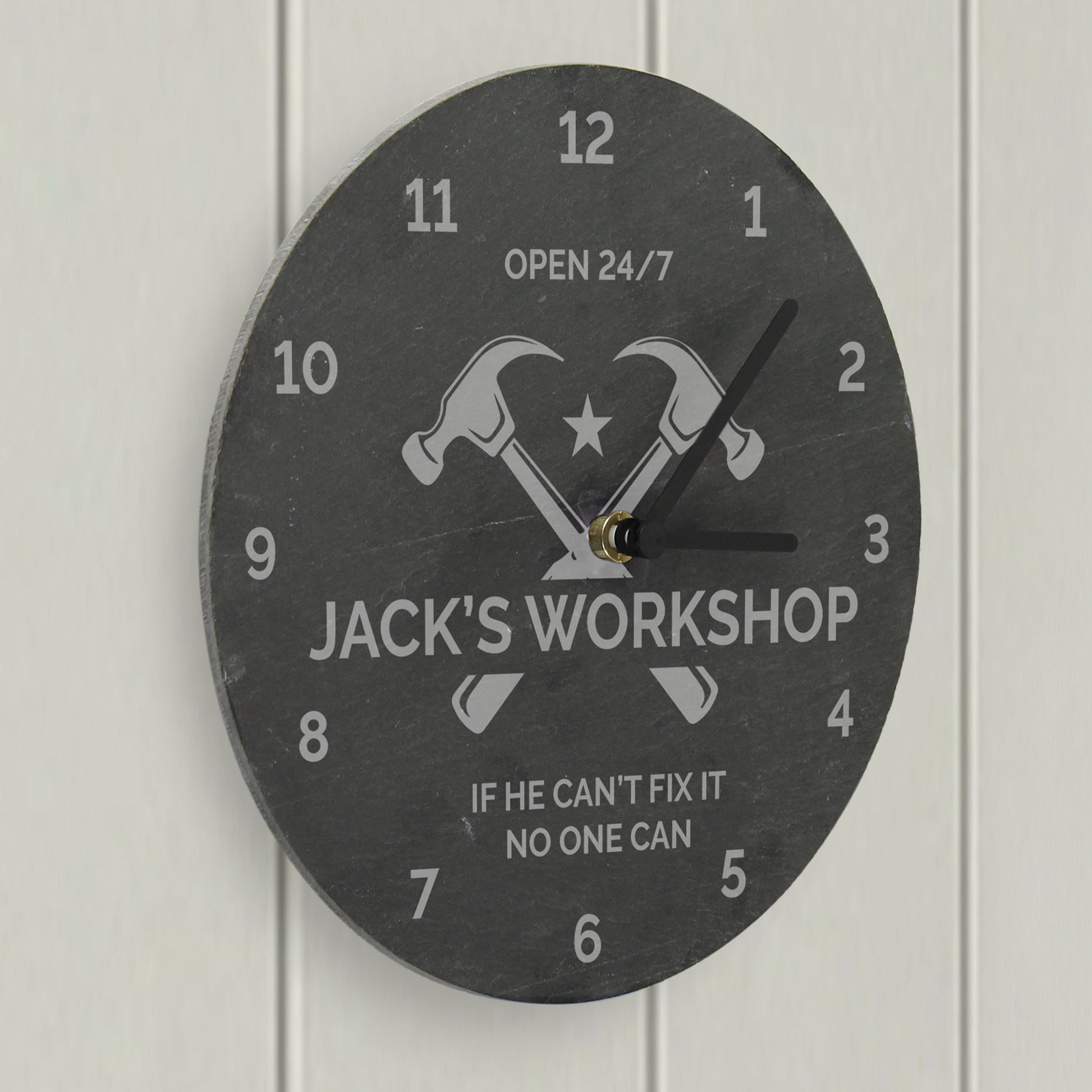 Wall clock with 'Jack's Workshop' design on a white background