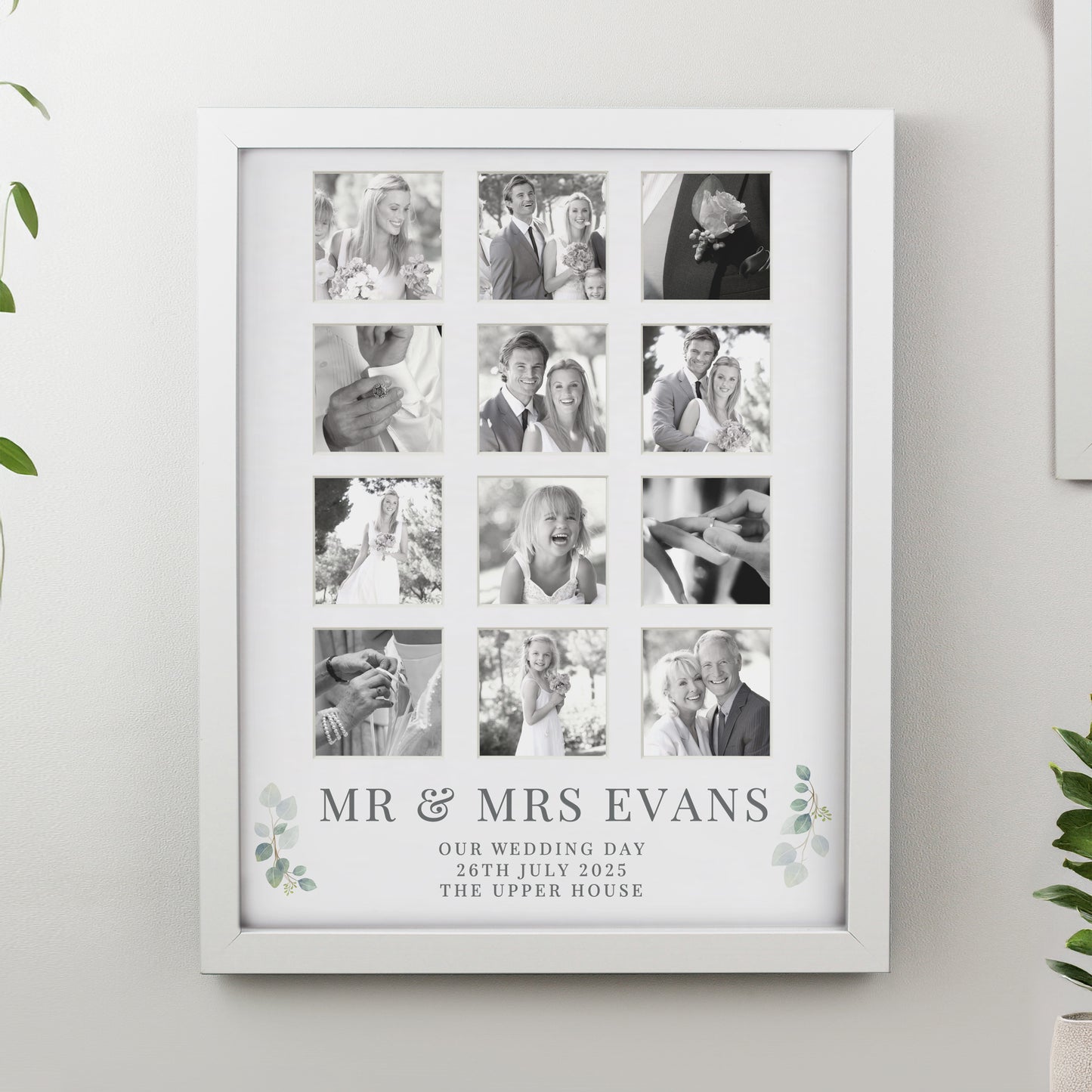 Framed collage of wedding photos with 'Mr & Mrs Evans' text on a light gray wall.