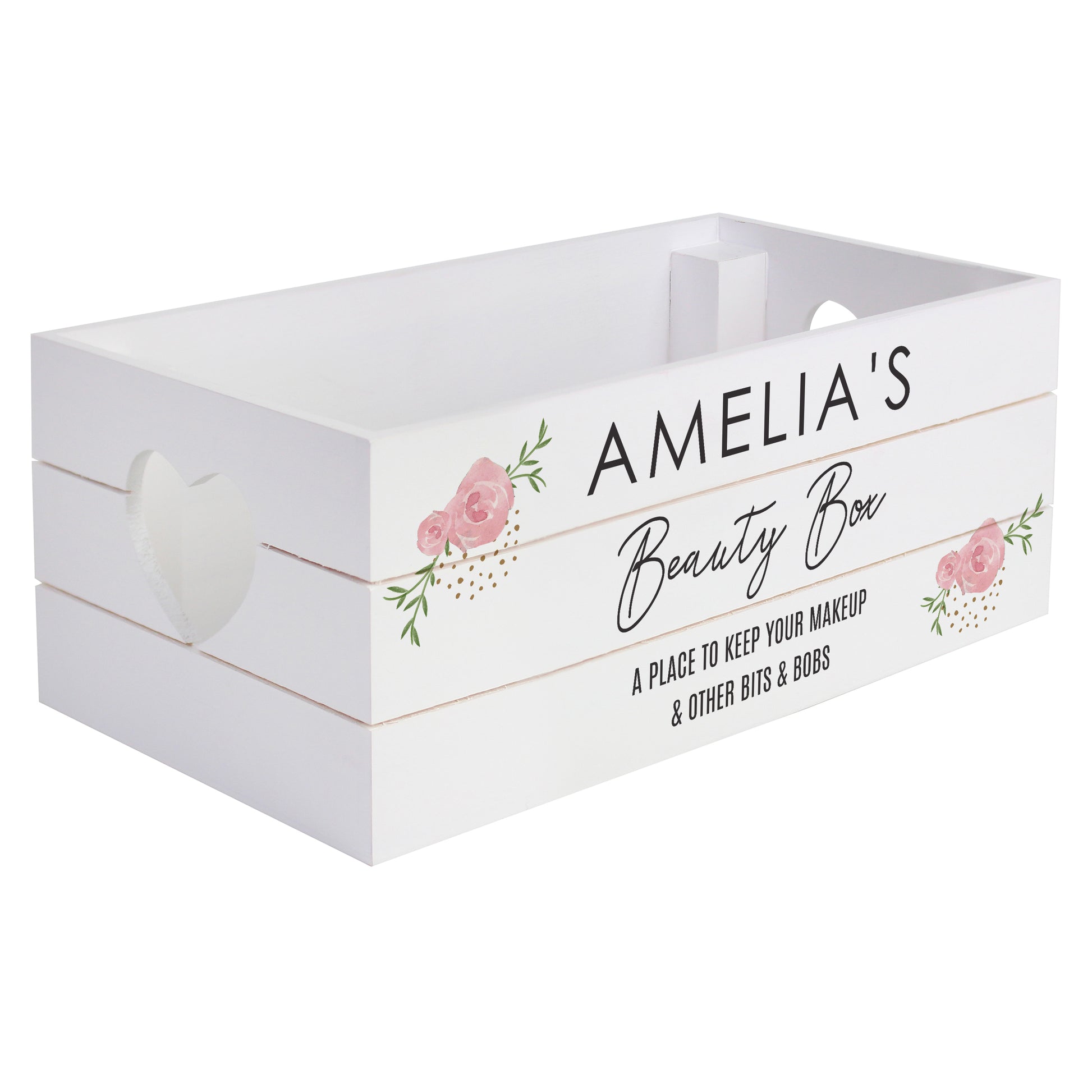 White wooden storage crate with pink rose design on the corners. Heart shaped cut out handles. Shown on a white background.