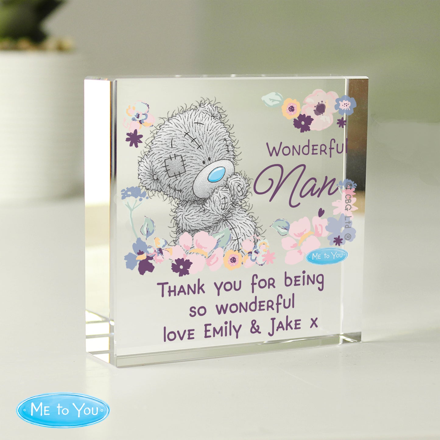 Glass plaque with teddy bear design and floral elements, featuring text 'Wonderful Nan' and 'Me to You' branding.