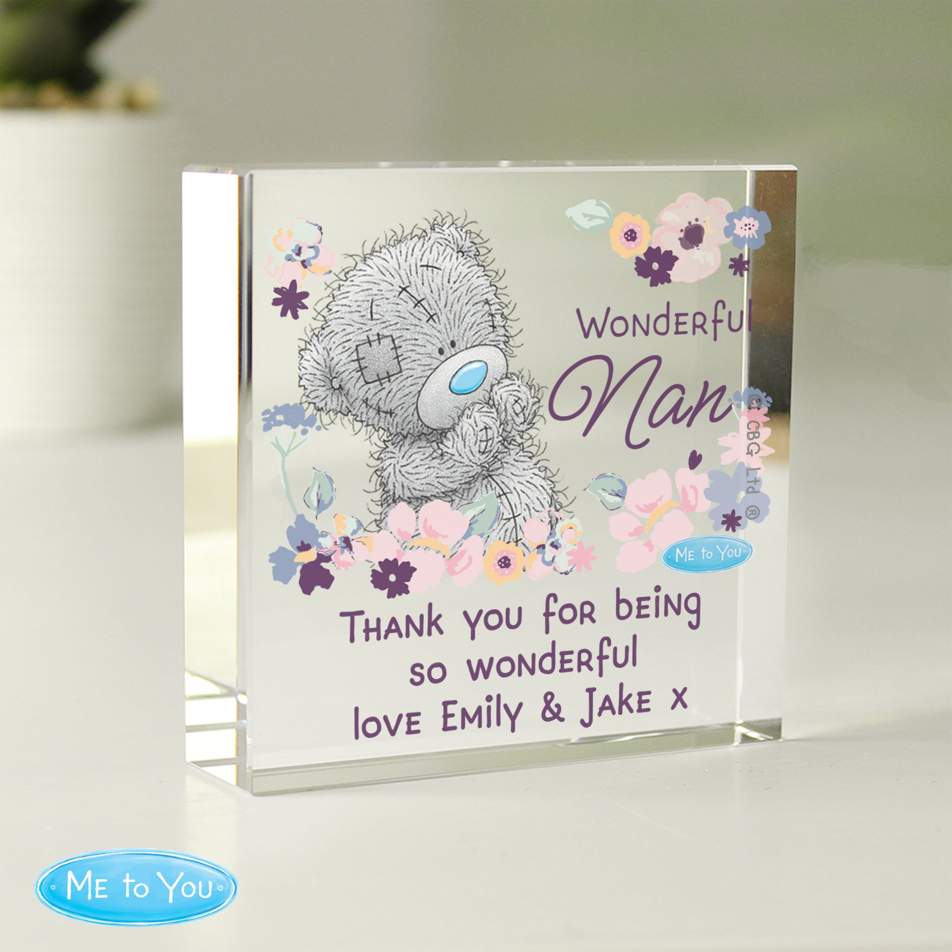 Glass plaque with teddy bear design and floral elements, featuring text 'Wonderful Nan' and 'Me to You' branding.