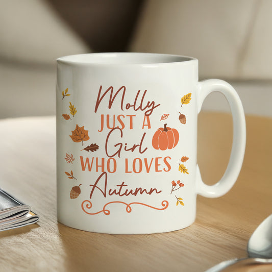 White personalised mug with autumn-themed text and graphics 
