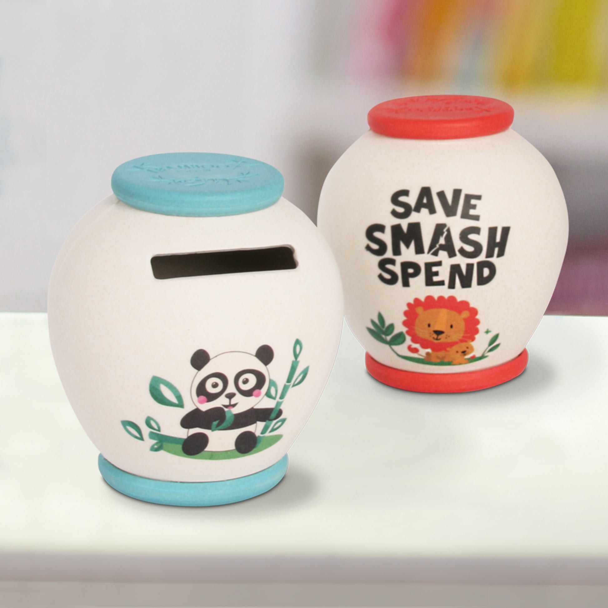 Smash Pots showing example reverse image with colourful character and the text SAVE SMASH SPEND.