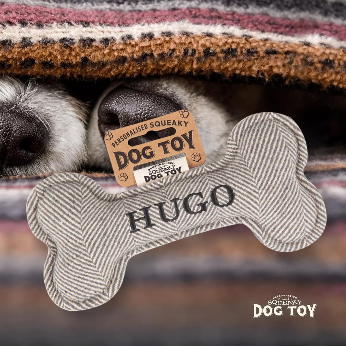 Named Squeaky Dog Toy- Hugo. Bone shaped herringbone tweed pattern dog toy. 
