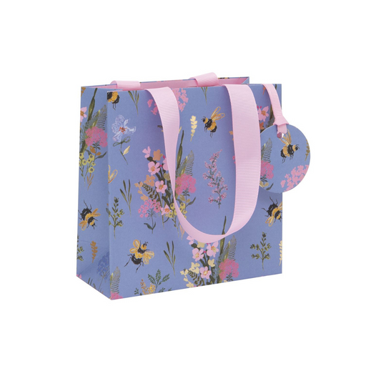 Pretty blue bag with spring flowers and bumble bees, pink ribbon and matching tag