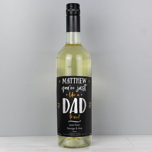 Wine bottle with a personalised label on a grey background