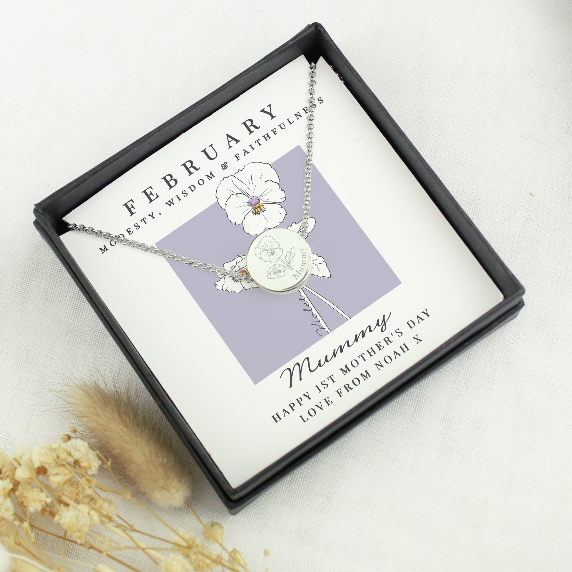Necklace with floral design in a gift box and February backing card