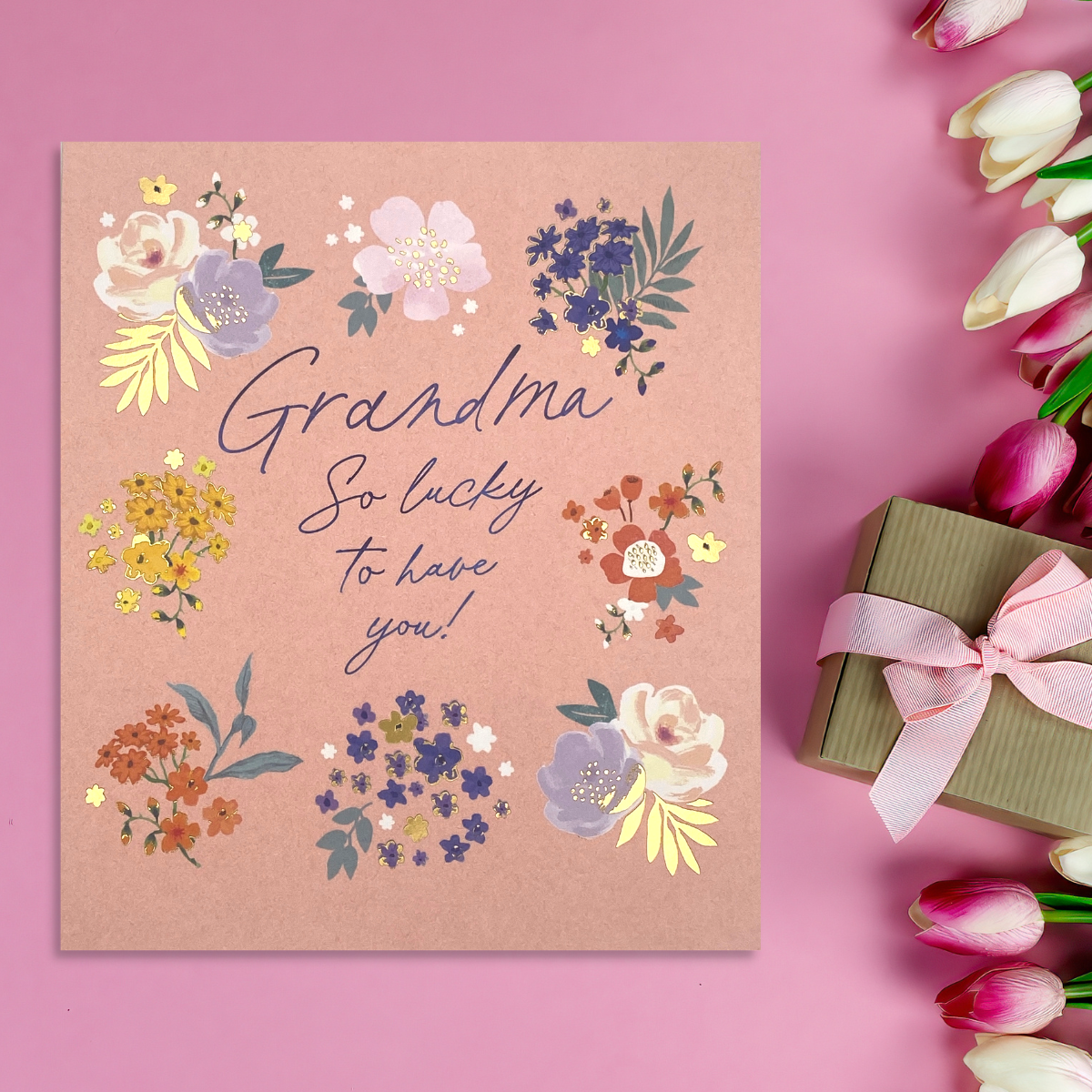 Peach colour card with navy script text and floral illustrations
