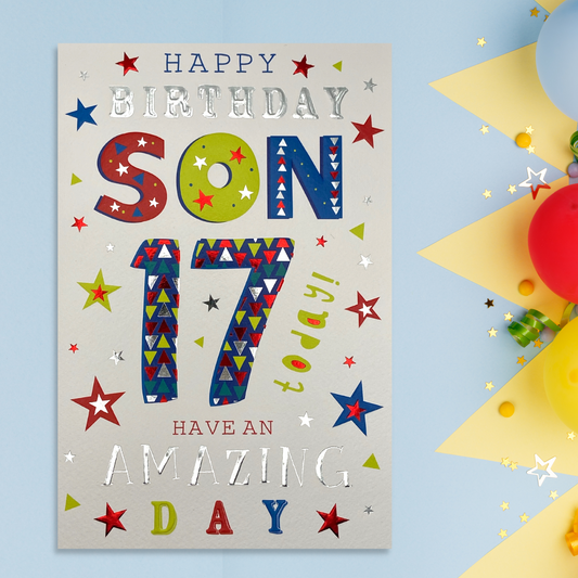 Front image with bold and bright multicoloured printed text with foil details