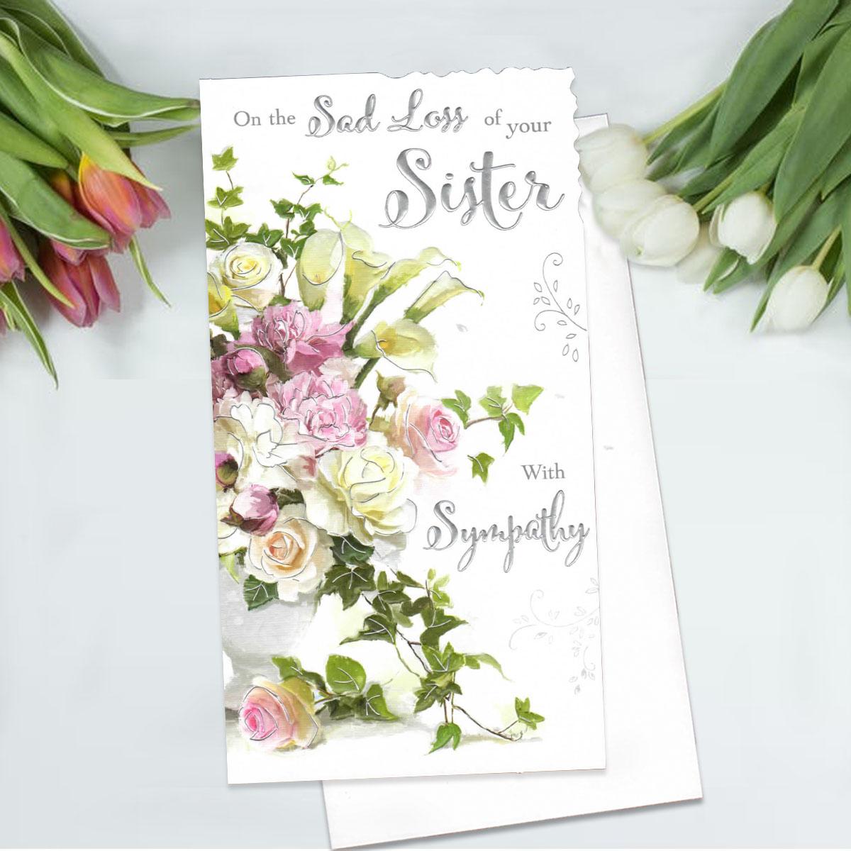 Floral Loss Of Sister Sympathy Card Alongside Its White Envelope