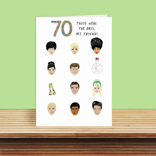 Age 70 Famous Icons Birthday Card Sitting On A Display Shelf
