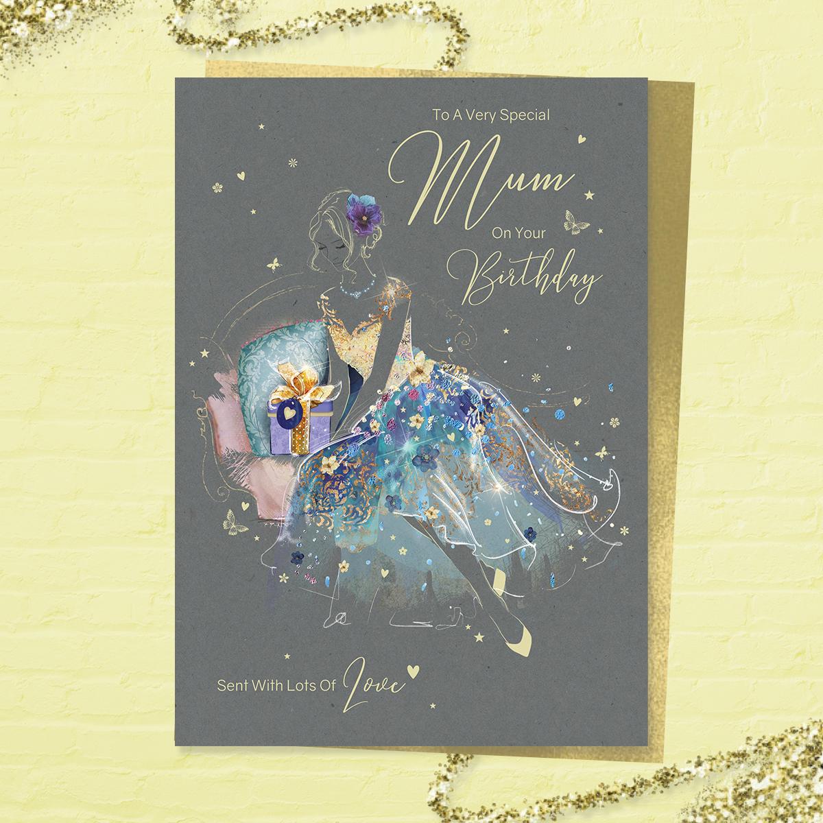 Just For You Mum On Your Birthday' larger card from the 'Grace' range. Beautiful Lady in A Blue And Gold Dress. Added Sparkle And Gold Foil Detail. Printed Insert With Colour Image And Heartfelt Verse. Complete With Gold Colour Envelope