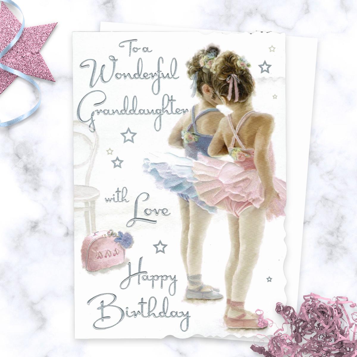 To A Wonderful Granddaughter  With Love Happy Birthday' Card Featuring Two Little Girls Dressed For Ballet Class! With Added Sparkle And Silver Foil Detail. Complete With White Envelope