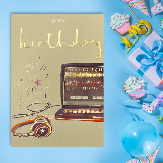 Lapton And Headphones Greeting Card Design Displayed In Full