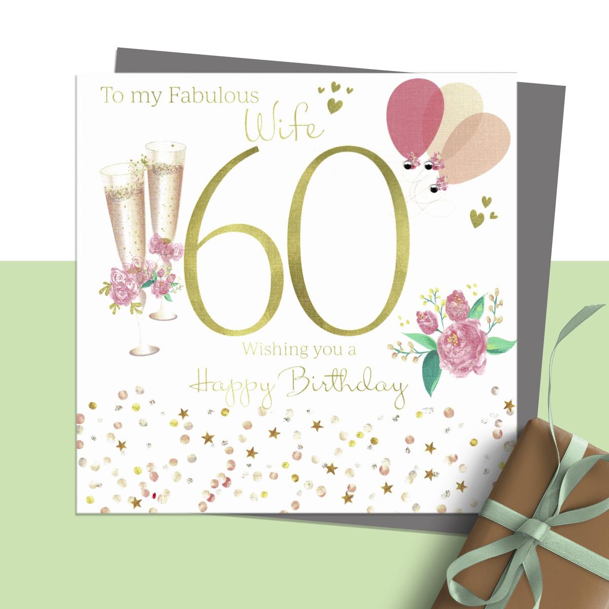 To My Fabulous Wife 60 Wishing You A Happy Birthday' Featuring Champagne Flutes, Flowers And Balloons. Hand Finished With Sparkle And Jewel Embellishments. Blank Inside For Own Message. Complete With Silver Coloured Envelope